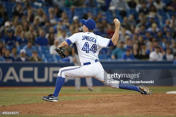 Casey Janssen of the Toronto Blue Jays delivers a pitch in the ninth inning during MLB game action against the Tampa Bay Rays on May 27, 2014 at...
