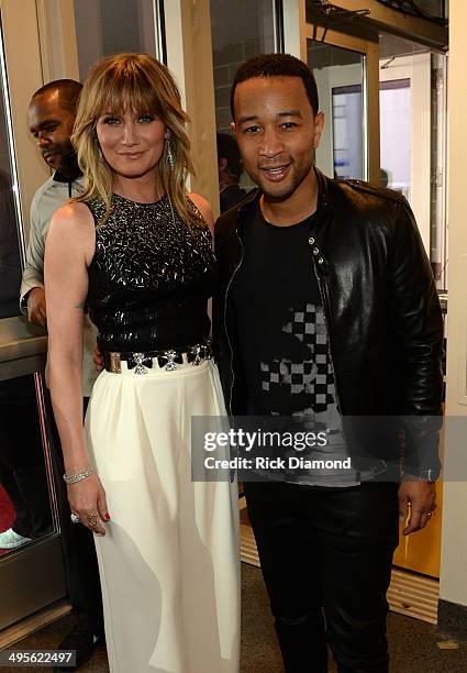 Jennifer Nettles and John Legend attend the 2014 CMT Music Awards at Bridgestone Arena on June 4, 2014 in Nashville, Tennessee.