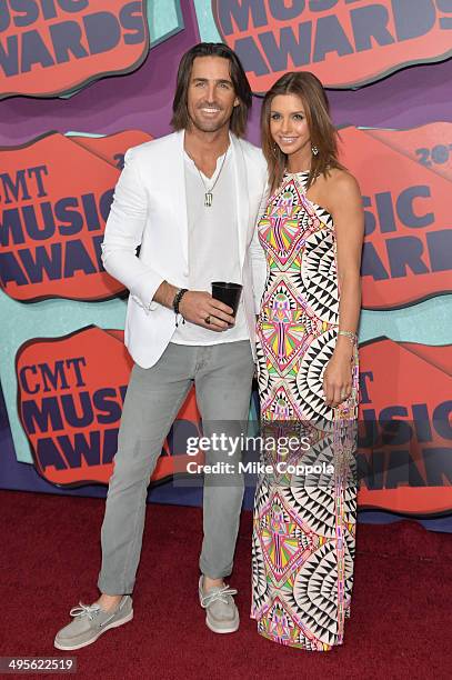 Jake Owen and Lacey Buchanan attend the 2014 CMT Music awards at the Bridgestone Arena on June 4, 2014 in Nashville, Tennessee.