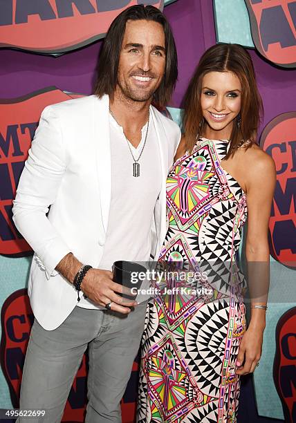 Jake Owen and Lacey Buchanan attend the 2014 CMT Music awards at the Bridgestone Arena on June 4, 2014 in Nashville, Tennessee.