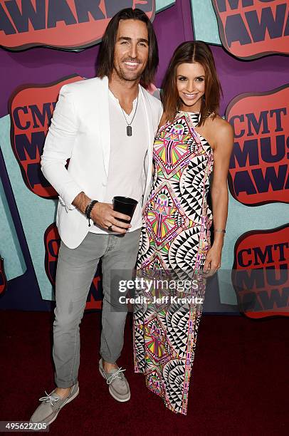 Jake Owen and Lacey Buchanan attend the 2014 CMT Music awards at the Bridgestone Arena on June 4, 2014 in Nashville, Tennessee.