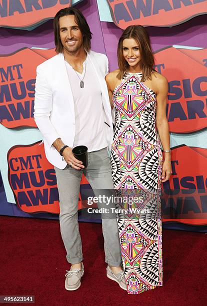 Jake Owen and Lacey Buchanan attend the 2014 CMT Music awards at the Bridgestone Arena on June 4, 2014 in Nashville, Tennessee.