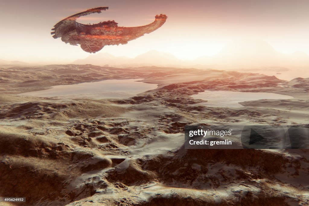 Alien spaceship flying over Martian landscape with water