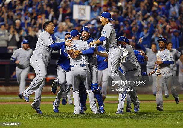 The Kansas City Royals celebrate defeating the New York Mets to win Game Five of the 2015 World Series at Citi Field on November 1, 2015 in the...