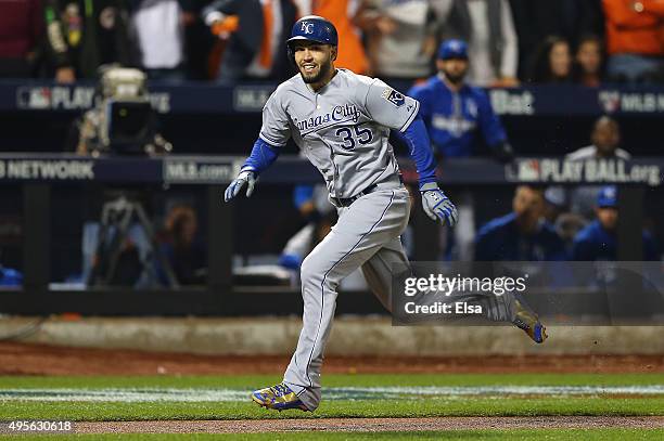 Eric Hosmer of the Kansas City Royals runs on his way to scoring a run off of a grounded out hit by Salvador Perez to tie the game in the ninth...