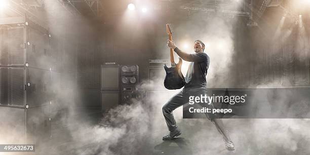 rock star - rock musician stock pictures, royalty-free photos & images