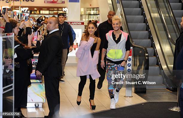 Ariana Grande meets fans with Frankie Grande to launch her debut fragrance "Ari by Ariana Grande" at Boots in London Piccadilly on November 4, 2015...