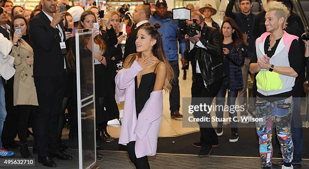 Ariana Grande meets fans with Frankie Grande to launch her debut fragrance "Ari by Ariana Grande" at Boots in London Piccadilly on November 4, 2015...