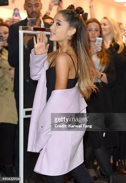 Ariana Grande attends a photocall to support the launch of her debut fragrance, Ari by Ariana Grande and also meet and greet her fans at Boots,...