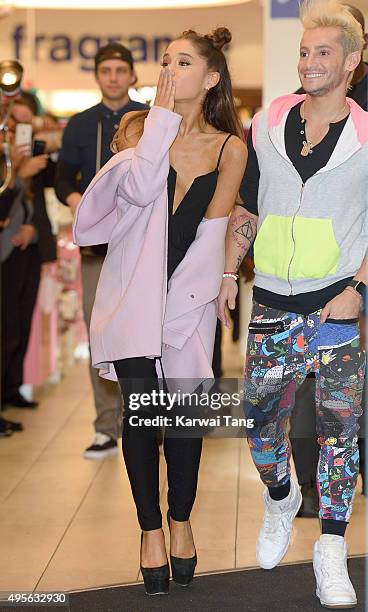 Ariana Grande attends a photocall to support the launch of her debut fragrance, Ari by Ariana Grande and also meet and greet her fans at Boots,...