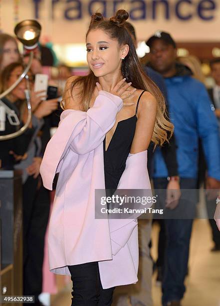 Ariana Grande attends a photocall to support the launch of her debut fragrance, Ari by Ariana Grande and also meet and greet her fans at Boots,...