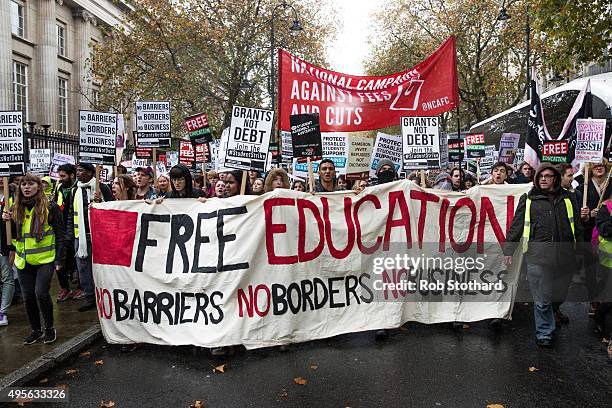 Protestors march through central London during a protest against education cuts and tuition fees on November 4, 2015 in London, England. University...