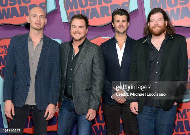 Jon Jones, Mike Eli, Chris Thompson and James Young of the Eli Young Band attend the 2014 CMT Music awards at the Bridgestone Arena on June 4, 2014...