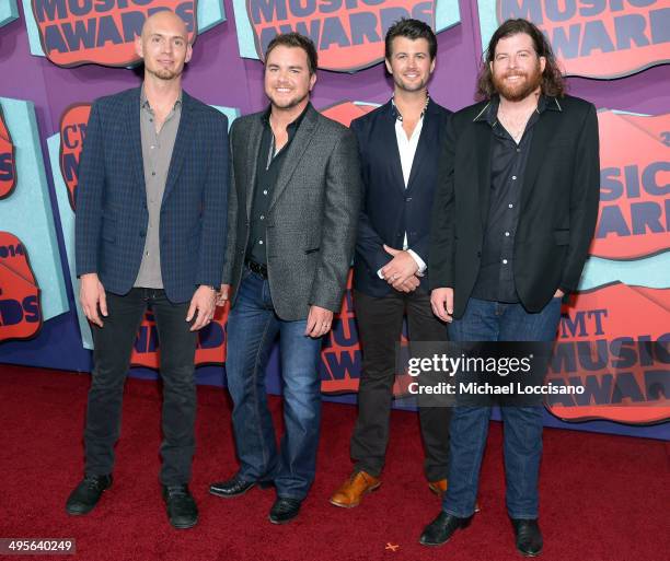 Jon Jones, Mike Eli, Chris Thompson and James Young of the Eli Young Band attend the 2014 CMT Music awards at the Bridgestone Arena on June 4, 2014...