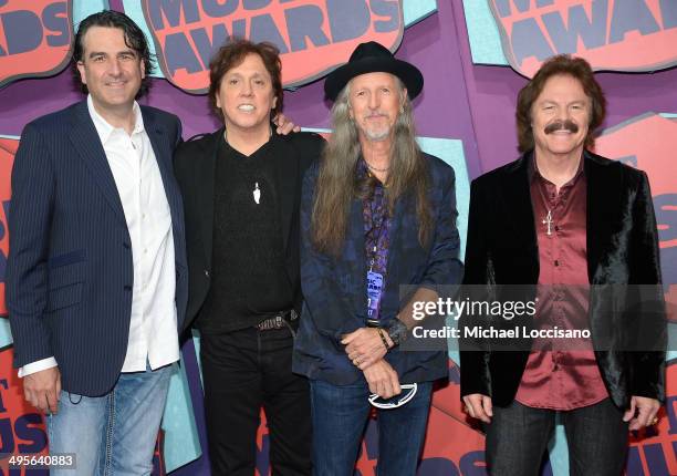 The Doobie Brothers attend the 2014 CMT Music awards at the Bridgestone Arena on June 4, 2014 in Nashville, Tennessee.