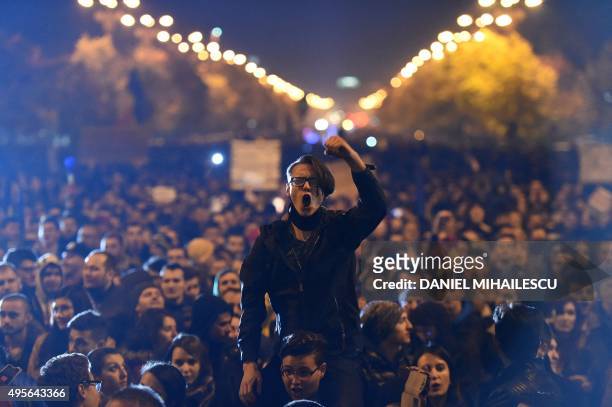 Romanians protest against the political class and Romanian authorities during the second day of protest in Bucharest November 4, 2015 after Romanian...