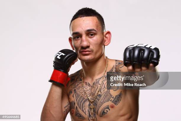 Max Holloway poses for a post-fight portrait after his bout during the UFC 172 event at the Baltimore Arena on April 26, 2014 in Baltimore, Maryland.