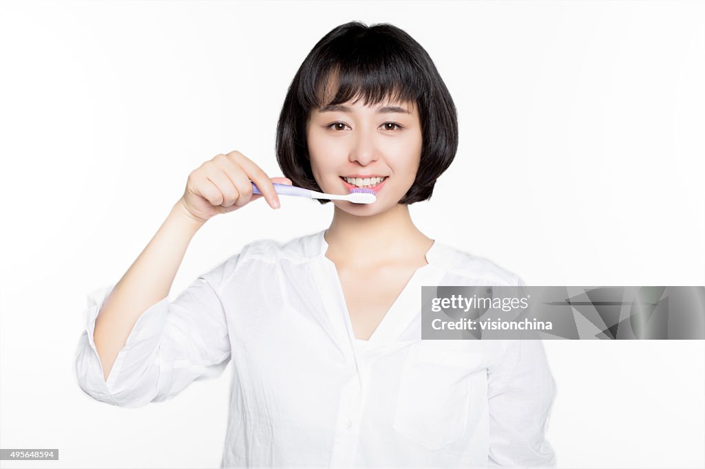 Beautiful woman clean mouth