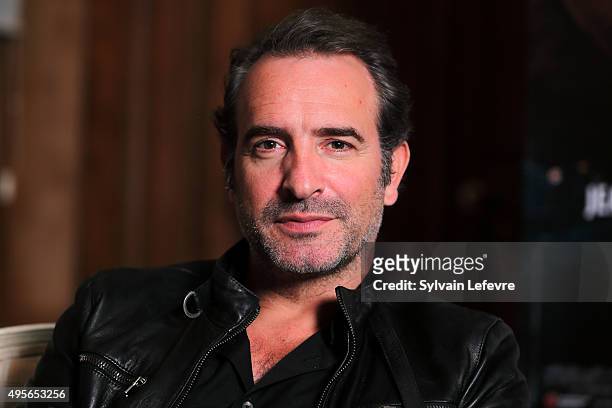 French actor Jean Dujardin poses during photo session for film "Un + Une" on November 4, 2015 in Lille, France.