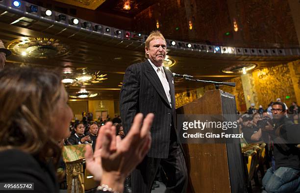 Raiders owner Mark Davis gets applause after responding to a fans question during a town hall meeting with NFL executives where fans voice their...