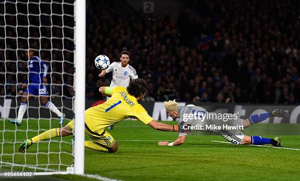 Aleksandar Dragovic of Dynamo Kyiv scores an own goal to open the scoring during the UEFA Champions League Group G match between Chelsea FC and FC...