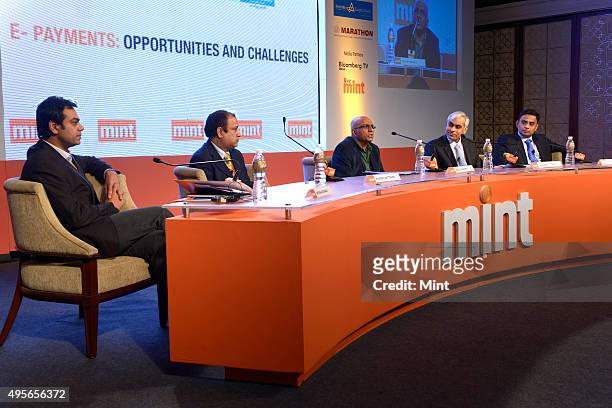 Nitish Asthana, executive director, First data India-ICICI Merchant Services, Rajeeb Chatterjee, head, mobile Banking and ATMs, HDFC Bank Ltd.,...