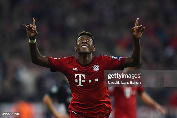 David Alaba of Bayern Muenchen celebrates scoring his side's third goal during the UEFA Champions League Group F match between FC Bayern Muenchen and...