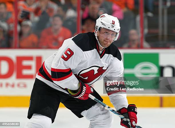 Jiri Tlusty of the New Jersey Devils skates against the Philadelphia Flyers on October 29, 2015 at the Wells Fargo Center in Philadelphia,...