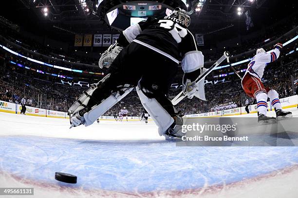 Benoit Pouliot of the New York Rangers scores a first period goal against goaltender Jonathan Quick of the Los Angeles Kings in the first period...