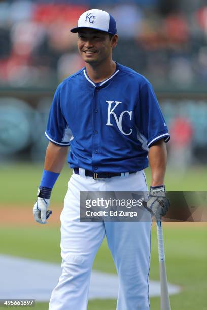 Norichika Aoki of the Kansas City Royals walks off the field after taking batting practice prior to a game against the St. Louis Cardinals at...