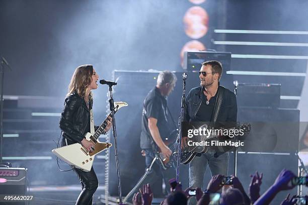 Lzzy Hale and Eric Church perform during the 2014 CMT Music awards at the Bridgestone Arena on June 4, 2014 in Nashville, Tennessee.