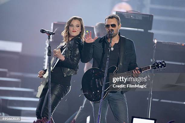 Lzzy Hale and Eric Church perform during the 2014 CMT Music awards at the Bridgestone Arena on June 4, 2014 in Nashville, Tennessee.