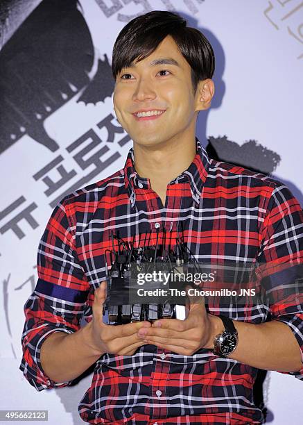 Si-Won of Super Junior attends the movie 'No Tears for the Dead' VIP premiere at Yeongdeungpo CGV on May 30, 2014 in Seoul, South Korea.