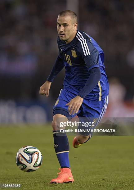 Argentina's forward Rodrigo Palacio controls the ball during a friendly football match against Trinidad and Tobago at the Monumental stadium in...