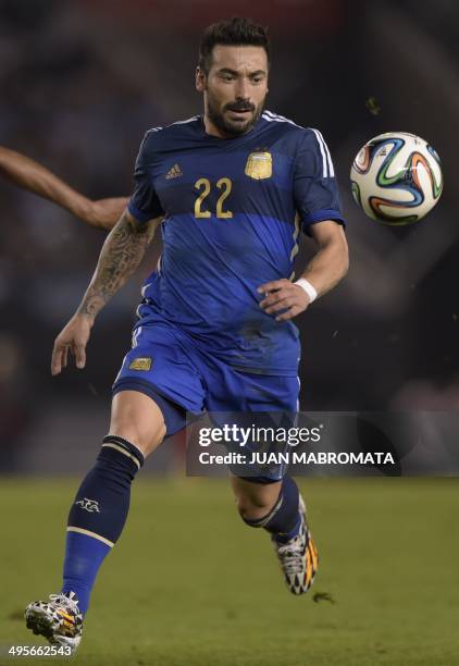 Argentina's forward Ezequiel Lavezzi controls the ball during a friendly football match against Trinidad and Tobago at the Monumental stadium in...