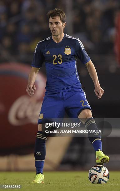 Argentina's defender Jose Basanta controls the ball during a friendly football match against Trinidad and Tobago at the Monumental stadium in Buenos...