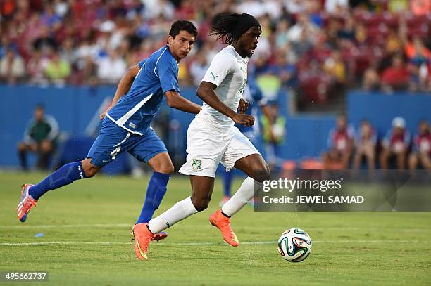 Ivory Coast's forward Gervinho approaches with the ball to score a goal during a World Cup preparation match between Ivory Coast and El Salvador at...