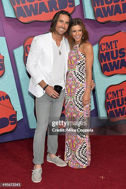 Jake Owen and Lacey Buchanan attend the 2014 CMT Music awards at the Bridgestone Arena on June 4, 2014 in Nashville, Tennessee.