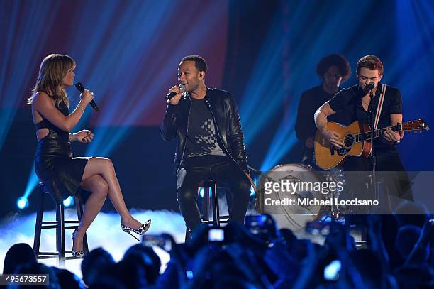Jennifer Nettles, John Legend and Hunter Hayes perform onstage at the 2014 CMT Music Awards at Bridgestone Arena on June 4, 2014 in Nashville,...