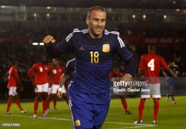 Rodrigo Palacio of Argentina celebrates after scoring the opening goal during a FIFA friendly match between Argentina and Trinidad & Tobago at...