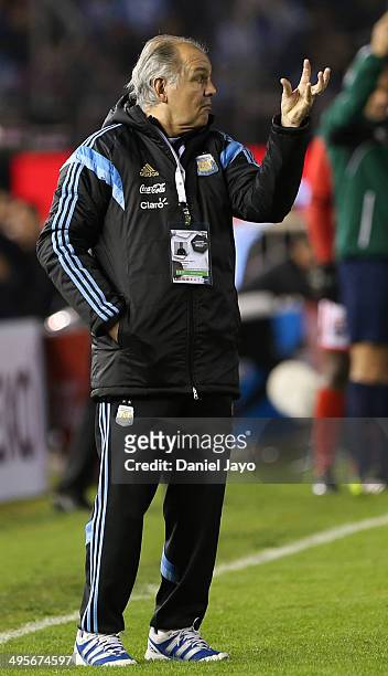 Alejandro Sabella, coach of Argentina, gives instructions to his players during a FIFA friendly match between Argentina and Trinidad & Tobago at...
