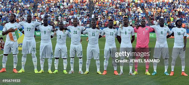 Ivory Coast's national soccer team members sign their national anthem before a World Cup preparation match between Ivory Coast and El Salvador at the...
