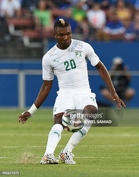 Ivory Coast's midfielder Die Geoffroy Serey kicks the ball during a World Cup preparation match between Ivory Coast and El Salvador at the Toyota...