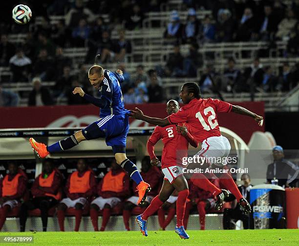 Rodrigo Palacio of Argentina heads the ball during a FIFA friendly match between Argentina and Trinidad & Tobago at Monumental Antonio Vespucio...