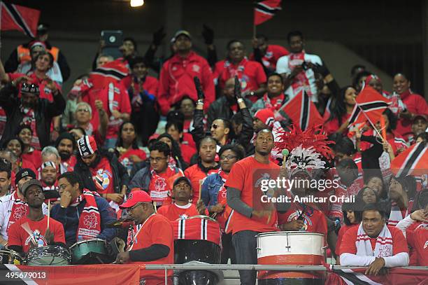 Fans of Trinidad & Tobago cheer for their team during a FIFA friendly match between Argentina and Trinidad & Tobago at Monumental Antonio Vespucio...