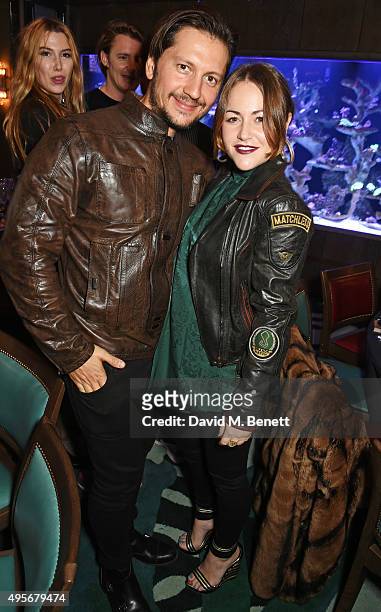 Michele Malenotti and Jaime Winstone attend the launch of the new Matchless Star Wars collection at Sexy Fish on November 4, 2015 in London, England.