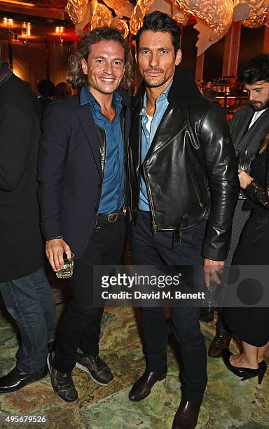 Manuele Malenotti and David Gandy attend the launch of the new Matchless Star Wars collection at Sexy Fish on November 4, 2015 in London, England.
