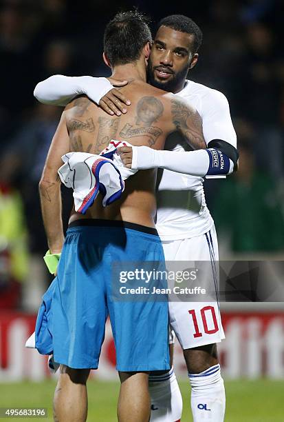 Alexandre Lacazette of Lyon greets Danny of FC Zenit following the UEFA Champions league match between Olympique Lyonnais and FC Zenit St Petersburg...