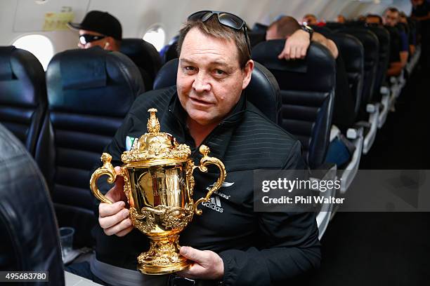 All Black coach Steve Hansen poses with the Webb Ellis Cup enroute to Christchurch for the New Zealand All Blacks welcome home celebrations on...