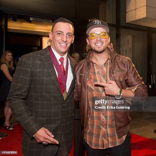 Trent Tomlinson and Love and Theft's Stephen Liles attend the 63rd Annual BMI Country awards on November 3, 2015 in Nashville, Tennessee.